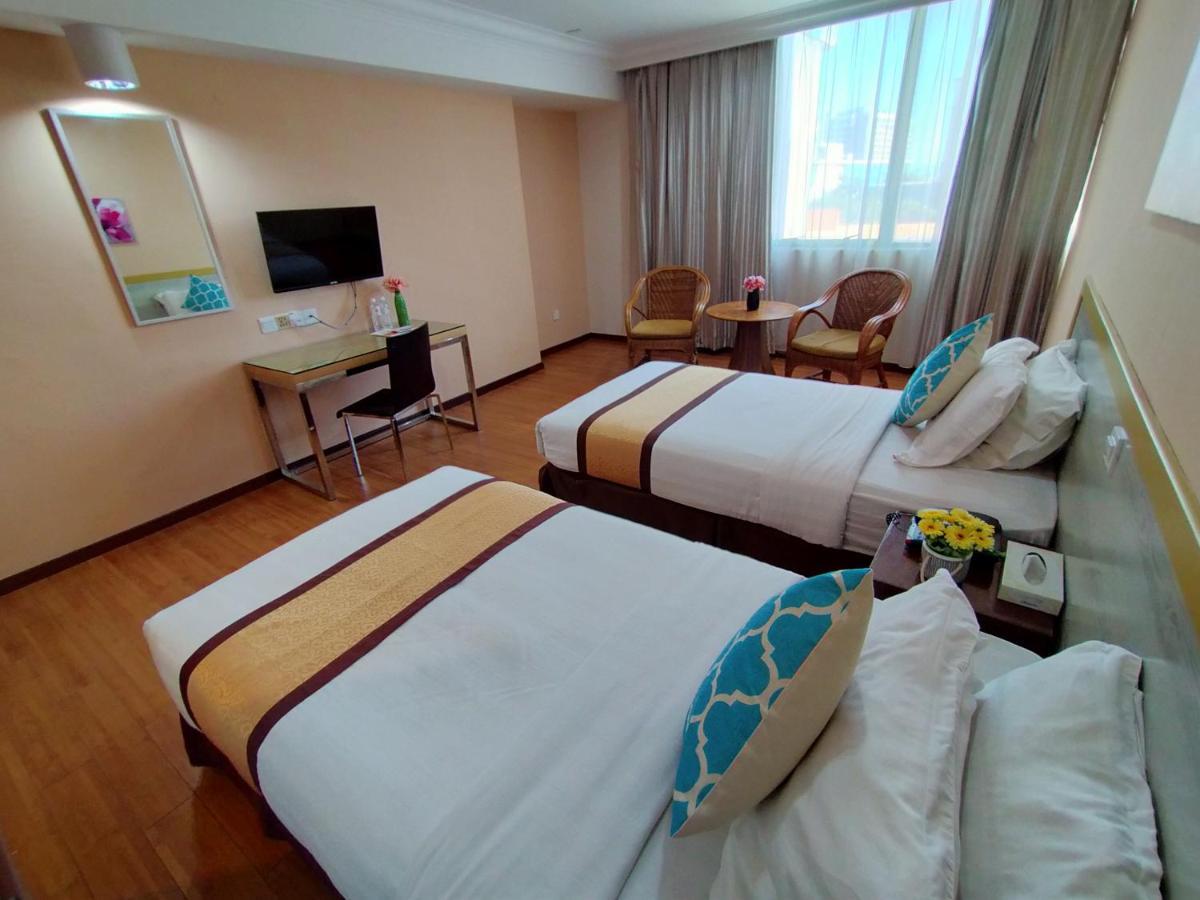 Td Plaza Hotel Kota Kinabalu Buitenkant foto